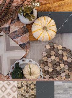 various types of tiles and pumpkins on the floor