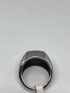 Cool Vintage Rock and Roll star men's ring Nice heavy ring, Silver Stainless Steel Unused stock from the 1980's We sizes 6.75-to 16 Many sizes These CAN NOT be re sized Please add your size to the order in a message and I will send the size you require. If I am out of stock in your size, I will list the ones I have available for replacement. If I am sold out in the sizes you would prefer, I will cancel and refund you, Thank you All jewelry is shipped in a nice gift box. Check out our over a THOU Formal Stainless Steel Rectangular Signet Ring, Formal Rectangular Stainless Steel Signet Ring, Classic Silver Stainless Steel Signet Ring, Silver Stainless Steel Signet Ring With Polished Finish, Rectangular Silver Stainless Steel Signet Ring, Formal Metal Signet Ring With Polished Finish, Formal Polished Metal Signet Ring, Titanium Silver Ring Jewelry, Silver Titanium Ring