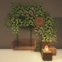 a tree with flowers on it next to two benches and a lamp in the middle