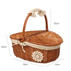 the size and measurements of a wicker picnic basket with lace trimming on it