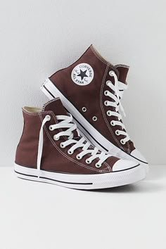 **Fit:** This style is in unisex sizing so a men's size 4 is a women’s size 6. Classic canvas high top Chuck Taylors. | Chuck Taylor All Star Hi Top Converse Sneakers at Free People in Brown, Size: 3 M Hi Top Converse, Brown Converse, Converse Brown, Converse Star, Shoe Wishlist, Swag Shoes