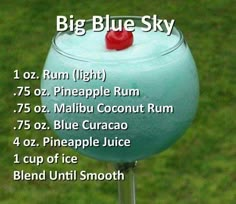 a blue drink sitting on top of a metal pole