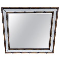 a mirror that is sitting on top of a table with a blue border around it