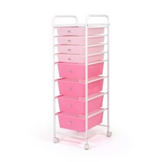 a white cart with pink drawers on it