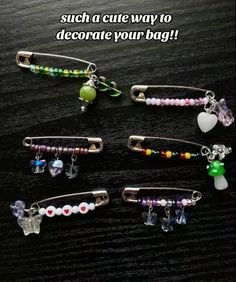 four hair clips with beads and charms attached to them on a wooden surface, text reads, such a cute way to decorate your bag