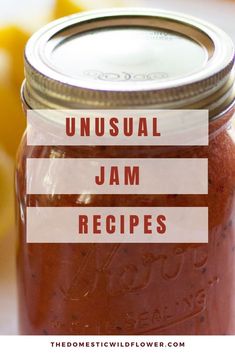 a jar filled with jam sitting on top of a table