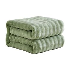 two green towels stacked on top of each other