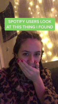 a woman with her hand on her mouth and the caption says, spotify users look at this thing i found