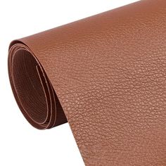 a brown leather textured tie on a white background