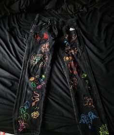 (The ones depicted in the photo are one of a kind and are a size 31x30) Custom-designed trousers featuring artistic bleach-effect patches and hand-painted motifs. I will make pants personalized to you, I want to make alternative handmade clothes for everyone. Just send me the measurements and I will get you some new style in no time! Punk Style Cotton Jeans For Festivals, Black Grunge Jeans For Festival, Trendy Cotton Straight Leg Jeans, Artistic Hand Painted Straight Leg Bottoms, Edgy Cotton Jeans For Festivals, Artistic Hand Painted Denim Bottoms, Hand Painted Straight Leg Cotton Jeans, Jeans With Chains, Custom Jean Jacket