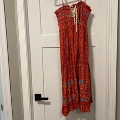 New With Tags Never Worn Red Floral Print Sundress For Casual Wear, Red Lined Midi Dress For Summer, Casual Red Dresses For Dress Down Occasions, Red Bohemian Sundress For Spring, Red Cotton Maxi Dress For Day Out, Casual Red Sundress For Summer, Casual Red Sundress For Brunch, Casual Lined Maxi Sundress, Red Lined Midi Dress For The Beach