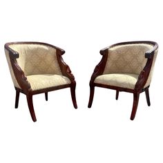 a pair of chairs sitting next to each other