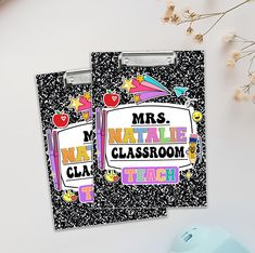 two black and white clipboards with the words mr and mrs in different colors on them