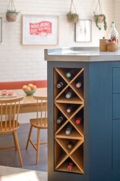 a wine rack in the middle of a kitchen island