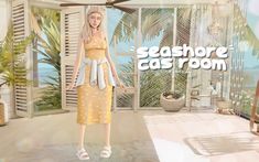 a woman in a yellow dress is standing in front of a window with the words seashore cat room on it