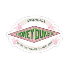 the logo for hogsmeade honey dukes is shown in pink and green