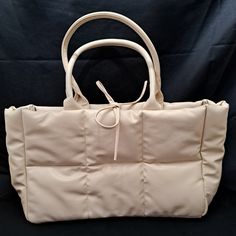 Nice Ulta Beauty Cream/Off-White Puffer Shoulder Tote Bag With Double Handles, New With Tags. Very Roomy Inside. Nwt 14.5" X 9.5" X 4.5" There Is A Very Faint Scuff Mark On One Side. I Actually Have To Look Closely To See It. I Had Difficulty Finding It Just Now. Puffer Tote Bag, Weekend Duffle Bag, Beauty Bags, Clear Tote Bags, White Puffer, Blue Tote, Beauty Cream, Just Now, Leather Weaving