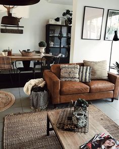 a living room filled with furniture and decor