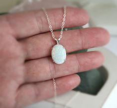 "Beautiful Large white lab-created opal pendant necklace. These gorgeous opals are very similar to natural mined opals. Lab-created opals contain 70-90% silica (from which natural opal is formed) and 10-30% resin. The resin makes the opal harder, stronger, unlike natural opals, which are known to be soft and fragile. Each opal displays a rainbow of color that sparkles with every catch of light. I've handset two different size opals in a solid sterling silver prong settings 16x12mm (5/8\" x 1/2\" Opal Cabochon Jewelry Gift, Opal Cabochon Jewelry For Gift, White Opal Pendant Jewelry, White Opal Jewelry Gift, Minimalist Opal Pendant Jewelry, Opal Necklace With Natural Stones As Gift, Oval Opal Pendant Jewelry As Gift, Opal Oval Pendant Jewelry For Gift, Opal Necklace With Natural Stones For Gift