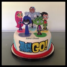 a birthday cake with cartoon characters on it