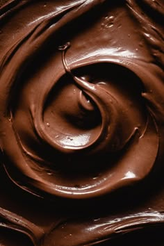 chocolate swirl swirled in the middle of it's chocolate icing, close up