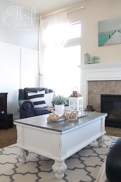 the living room is clean and ready to be used for christmas time, as well as decorations