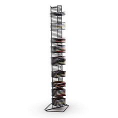 a tall metal rack filled with files on top of a white floor planing area