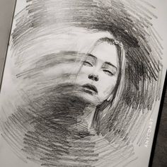 a pencil drawing of a woman's face with her eyes closed and hair blowing in the wind