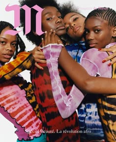 three women hugging each other on the cover of magazine