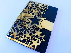 a blue book with gold stars on it