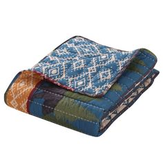 two quilted blankets folded on top of each other in different colors and patterns,