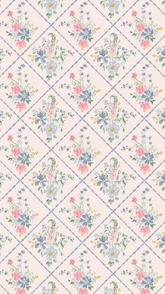 a floral wallpaper pattern with blue and pink flowers