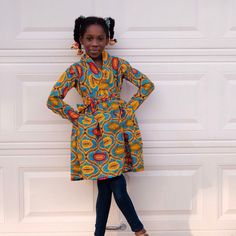 Girls African Print Handmade Knee Length Long Sleeve Wrapping Dress With Side Belt And Pockets Made With Cottton Fabric. Multi Color And Multi Fabric Design Dress For Girls From Age 2 To 10 Years Contact Me For A Bigger Sizes Short Ankara Gown, Ankara Gown, African Ankara, Upcycle Clothes Diy, African Print Fashion Dresses, African Print Fashion, Kids' Dresses, African Dress, Upcycle Clothes