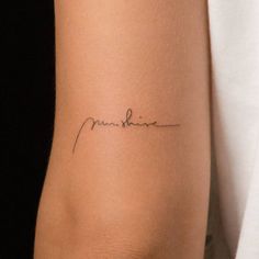 a woman's arm with a tattoo that reads, love is sunshine on it