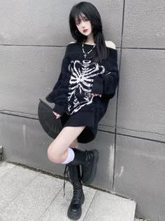 Step out of your comfort zone in this daring Grunge Skeletal Sweater. With a grungy ribcage design, it's the perfect way to showcase your edgy, moody style. Show them you're not afraid to take risks—it's a graveyard out there! Size Chart: Size Bust (cm) Shoulder (cm) Sleeve (cm) Length (cm) Bust (in) Shoulder (in) Sleeve (in) Length (in) S 102 54 45 60 40.16 21.26 17.72 23.62 M 104 55 45 60 40.94 21.65 17.72 23.62 L 106 56 46 61 41.73 22.05 18.11 24.02 XL 108 57 46 61 42.52 22.44 18.11 24.02 Des Loose Knitwear, Aesthetic Sweaters, Soft Girl Clothes, Autumn Knitwear, Skull Sweater, Pullover Mode, Grunge Streetwear, Gothic Skull, Punk Outfits