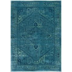 a blue rug with an ornate design on the top and bottom, in various colors