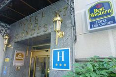 the front entrance to best western hotel in los angeles, with signage on the building