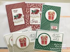 four christmas cards with different designs on them