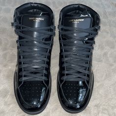 Saint Laurent Varnish Hi-Top Trainers. Brand New With Box, Shoe Dust Bags, Extra Laces And Certificate Of Authenticity. Size: Mens 45 Uk / 12 Us Color: Black/ Patent Leather Feel Free To Reach Out With Any Questions ! Luxury Black Patent Leather Sneakers, Designer Patent Leather Sneakers With Round Toe, Luxury High-top Patent Leather Sneakers, Designer High-top Patent Leather Sneakers, Designer Black Patent Leather Sneakers, Designer Patent Leather Sneakers For Formal Wear, Designer Patent Leather Sneakers For Formal Occasions, Designer Formal Patent Leather Sneakers, Luxury Patent Leather Formal Sneakers