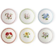 six plates with flowers painted on them