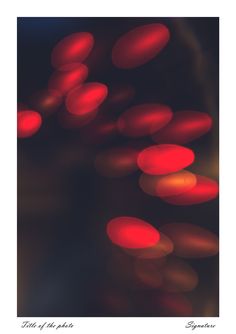 blurry photograph of red lights in the dark