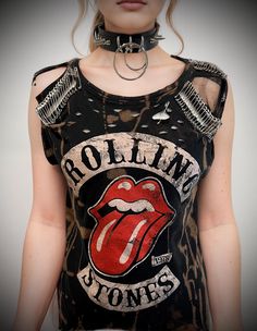 THE STITCHES Distressed Rock collection - This Rolling Stones T-shirt is a handmade bleached crop top/t-shirt made with a brand new officially licensed band shirt. - Distressed Rolling Stones crop top/shirt - Safety pin unisex hand-made crop/tee - Material: Bleached cotton Measurements: Small size (Ready to ship) M, L, XL, XXL Sizes (Made to order: 10 working days process for made to order) Width (armpit to armpit)  S : 18 Inches  M: 20 Inches L: 22 Inches XL: 24 Inches XXL: 26 Inches 3XL: 28 In Edgy Acid Wash T-shirt For Alternative Fashion, Distressed Rock T-shirt For Streetwear, Stonewashed Band Merch Crew Neck Top, Distressed Punk T-shirt, Distressed Washed Black Alternative T-shirt, Alternative Style Distressed Washed Black T-shirt, Washed Black Distressed Alternative T-shirt, Edgy Distressed Tops For Festival, Distressed Rock T-shirt For Concerts