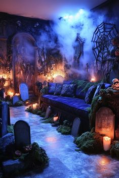 a living room filled with lots of furniture covered in fake moss and candles next to tombstones