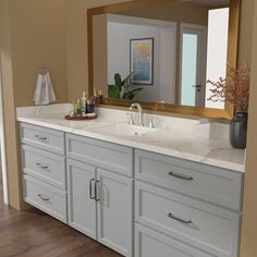 a bathroom with two sinks and large mirror