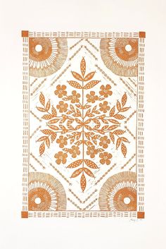 an orange and white square with flowers on it