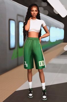 a woman standing in front of a train with her hands on her hips and wearing green shorts