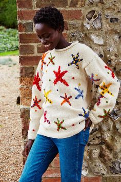 Women's Starfish Sweater - Individually hand knitted wool oversized jumper. Chunky knit sloppy joe pullover. Colourful french knots. Fair Trade & Handmade in Nepal A feast for the eyes. A bright starfish design with multicoloured french knots. An aquatic delight sure to bring cheer. This design is a revival of our vintage Star Fish Sweater.  100% Wool Unlined Knitted by Hand Dry clean - delicate Ladieswear S to fit UK size 8-10. US size 4-6 M to fit UK size 12-14. US size 8-10 L to fit UK size 16-18. US size 12-14 As our garments are handmade we do experience variation in sizing, so to ensure the best fit any information you can give us about the size of the person who the garment is for will be used by us to select the best individual fit we can. White Crew Neck Hand Knitted Pattern, White Crew Neck Knitting Pattern, Hand Knitted Jumpers, Knitting Group, Spring Knits, Sloppy Joe, Star Embroidery, French Knots, Sea Theme