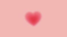 a red heart on a pink background