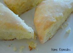 three pieces of pastry sitting on top of a white plate