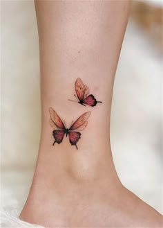 two butterflies tattoo on the ankle